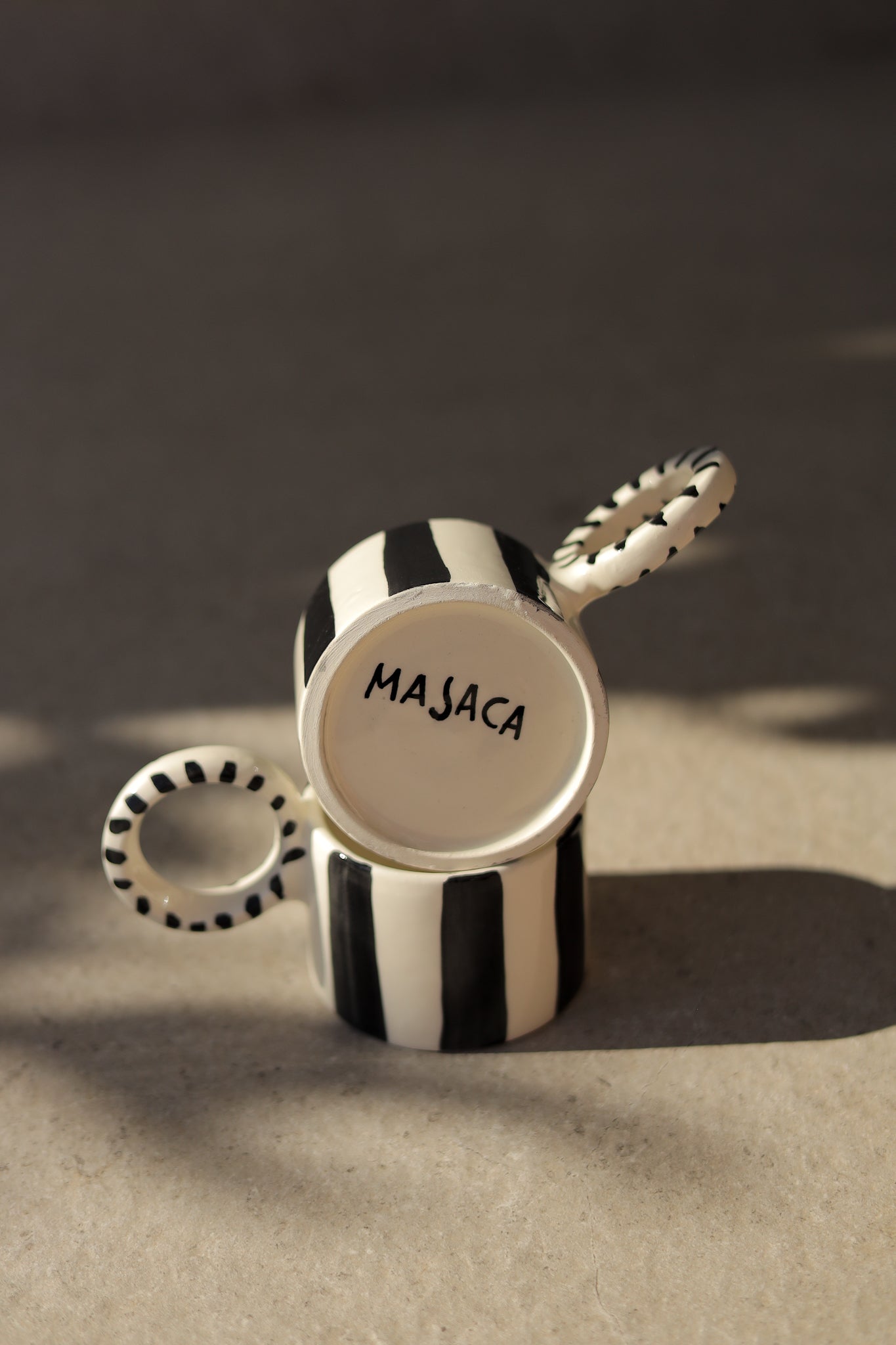 TAZA RAYAS NEGRAS