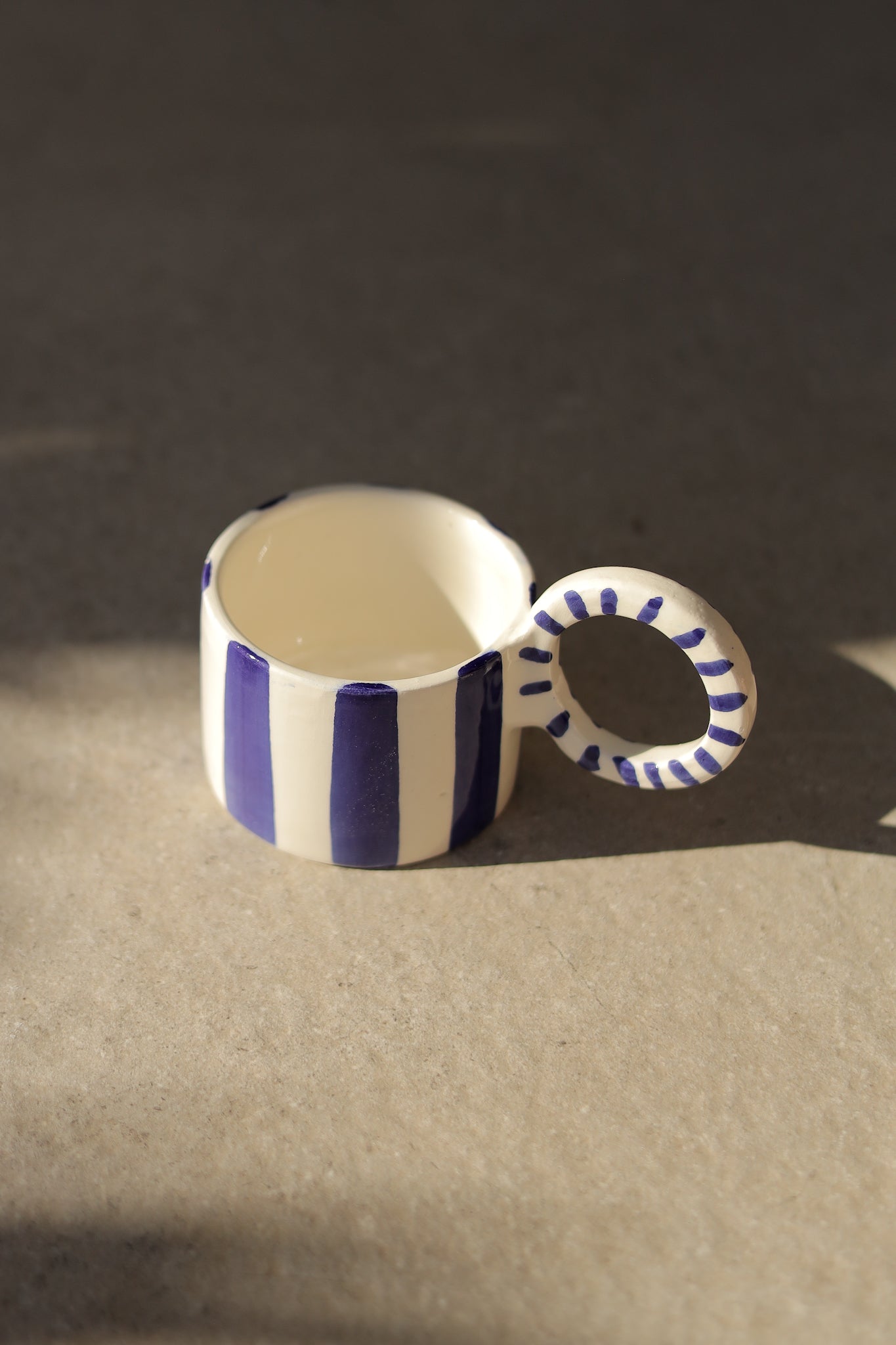 TAZA RAYAS AZULES