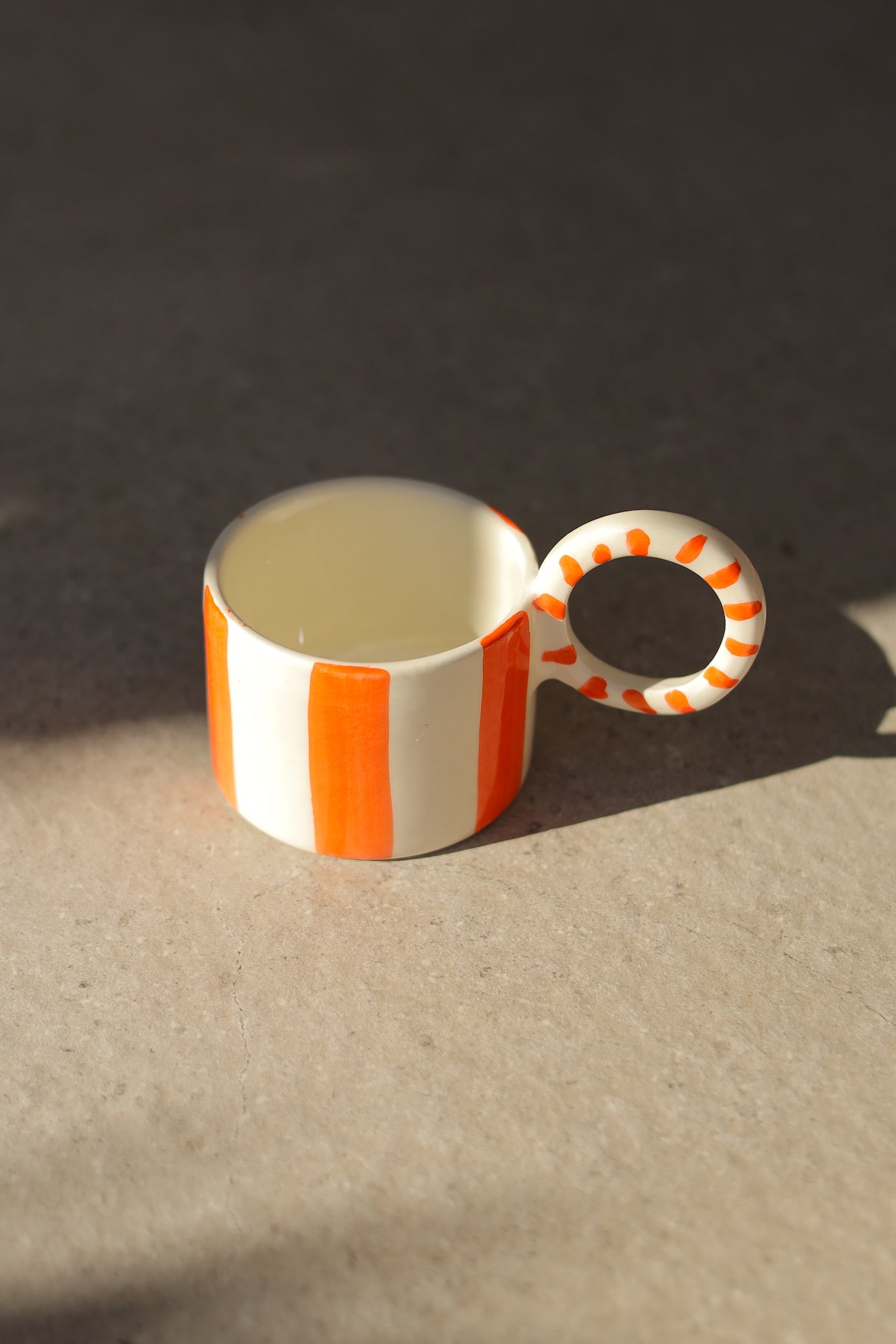 TAZA RAYAS NARANJA